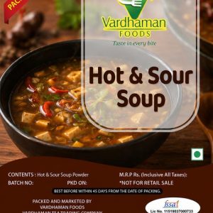 Vardhaman Foods Hot & Sour Soup powder pack of 10, featuring a black bowl filled with spicy hot and sour soup loaded with tofu cubes, red chilies, and fresh green herbs.