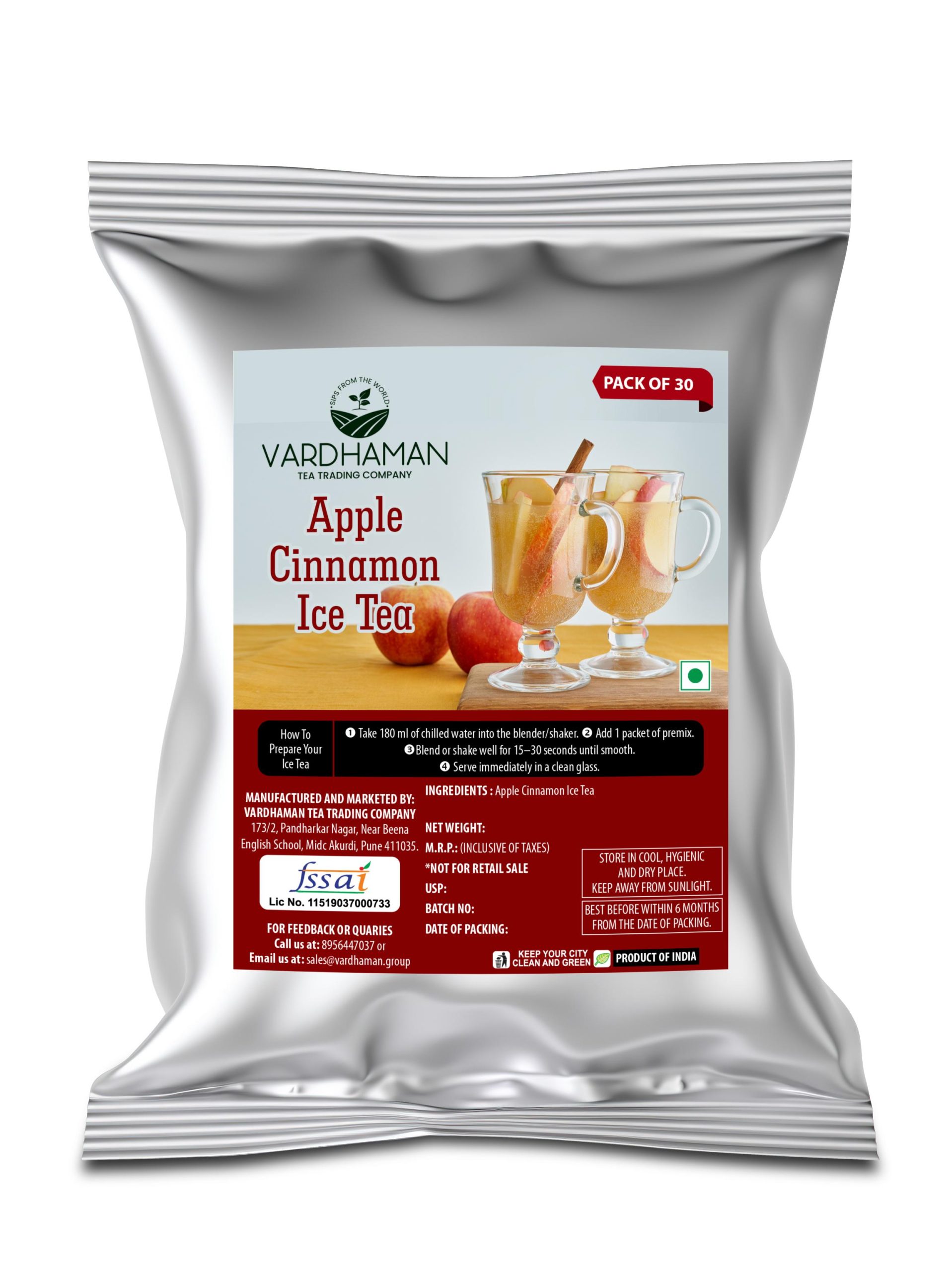 Vardhaman Tea Trading Company Apple Cinnamon Ice Tea pack of 30 foil pouch, displaying two glass mugs of iced tea garnished with red apple slices and a cinnamon stick.